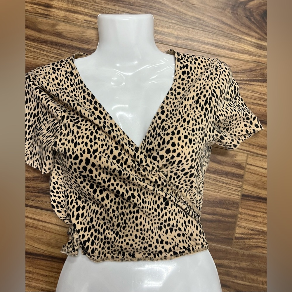 - Brandy Melville animal print wrap around top, one size fits all, gently …
